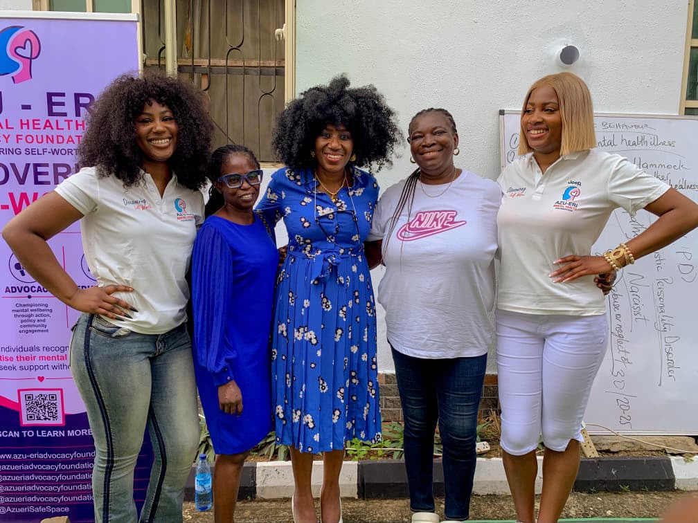 Azu-Eri team members standing together after a community session